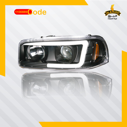 Al Barq for Car Accessories  - HEAD LAMP FOR GMC YUKON 02-06 BLACK WITH LENS (C-SHAPE) code 1100889 - HEAD
  LAMP FOR GMC YUKON 02-06 BLACK WITH LENS (C-SHAPE)