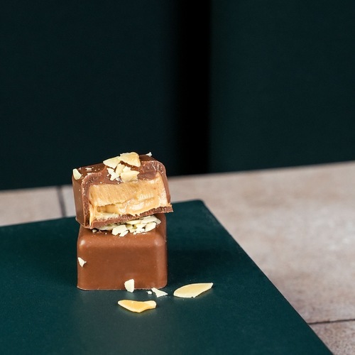 A. Bite - Almond Praline with roasted almond.