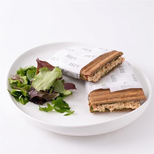 Spiced Tuna Sandwich - Brown ciabatta with marinated spiced tuna, sliced tomato, chopped jalapeño and basil pesto served with mix salad.