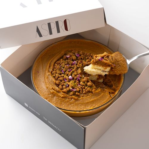 Aseeda with Cream Pudding - Dates and caramel aseeda stuffed with creamy pudding top with pistachio powder, crumble, and dried rose petals.