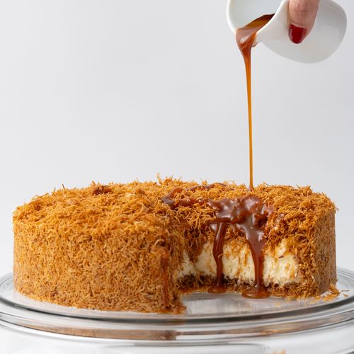 Kunafa cheesecake - Kunafa, creamy smooth cheese cake served with salted caramel sauce on the side.