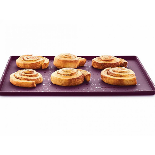 Silicone Baking Sheet With Rim - The new non-spill Silicone Baking Sheet with Rim is the latest addition to the Silicone Baking Forms range. You will finally be able to bake sweet and savoury recipes without making a mess in your oven; no more dripping or leaking thanks to its all-around rim! In addition, the pattern guides you into making different shapes: squares, rectangles and even circles!

Use the circles to bake perfectly round macarons and cookies or let your imagination run free...

Features and Benefits:
• It’s the ideal product for baking:
-Juicy or greasy preparations
-Dough for sweet and savoury rolls, sponge cake
-All kinds of everyday foods: fresh and frozen pizza, puffs, vegetables, fries, Pommes Duchesse, potatoes, stuffed vegetables, frozen and pre-baked bread, macarons, cookies, pastries, meringues and profiteroles
-It’s a very useful working surface, handy for quick preparations and clean-up
•Very easy storage; you can fold it, roll it or squeeze it into a container
N.B.: The Silicone Baking Sheet with Rim does not deform, even when it’s rolled up for storing. It may deform slightly during cooking but will return to its original shape when cooled.
• Easy to clean
• Dishwasher safe
• Withstands temperatures from – 25°C to +220°C:
-To bake in a conventional oven
-To cool in the fridge or freeze in the freezer
• Circles (3 cm diameter): ideal size to prepare French macarons but also cookies, meringues, etc. If all of the circles are used, you will be able to prepare 18 perfect French macarons (36 circles)
• Metric measurements to create squares/rectangles/triangles of equal size:
• Small dots every 1cm (both on the rim and on the flat surface)
• Large dots every 5cm (both on the rim and on the flat surface), indicated with numbers on the sides (from 0 cm to 25 cm)
• Surface finish of the pattern is glossy to be able to clearly see the pattern; surface finish of the rest of the product is etched
• Raised rim all around the outside edge that prevents liquids from overflowing, keeping your oven mess-free
• Perfect to use together with the Adjustable Rolling Pin; height of the rim (1,1cm) has been adjusted for both products to be used together. Simply use it vertically and turn the dough regularly to get the desired result
• Pattern on the top part of the rim, so as to be able to measure sizes even when the Baking Sheet is completely covered with dough

*The product images shown are for illustration purposes only. Price excludes product contents and any accessories used for display purposes.