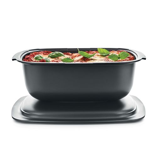 Ultra Pro 5.7 L Roasting Pan with Cover - Modular Design: The UltraPro cookware comprises two separate pieces—a base and a lid—offering versatile cooking options. Stackable Configuration: Designed for efficient storage, the cookware pieces are stackable, saving space in your kitchen cabinets.
 Part of a Stackable Series: This cookware is part of a series that interlocks with other pieces, facilitating organized storage solutions.Our unique UltraPro all-in-one material is not only safe for the oven but is also microwave, fridge, and freezer safe. 
 Rounded corners in the base and the domed cover optimize heat distribution and reduce hot spots that can result in overcooking. Steam release vents on the sides of the base and cover help prevent steam build-up and regulate humidity to brown your food nicely while retaining optimal moisture. The non-stick surface makes healthy foods easier, and a wide rim offers a secure grip when moving the pan.Specifications:  Material: Liquid Crystal Polymer(LCP)Dimensions: 
Base & Cover:  W 26.6 x H 14.8 x L 36.4 Base (5.7 L):  W 26.6 x H 10.5 x L 36.4 
 Cover (1.2 L): W 26.6 x H 3.7 x L 36.4 Temperature Rating: Min -25°C / -13°F - Max 250°C / 485°FBenefits:All in one solution: for everyday cooking (oven and microwave), storing (fridge or freezer) and serving; unique, high-end, lightweight material, resisting from -13°F/-25°C to 482°F/250°C​ Instructions for use are engraved inside the cover and in the bottom of the base. Convenient storage: The base and the cover are perfectly nestable. Built for daily use: will not rust or dent like metal pans or crumble like glass or ceramic Several configurations for unlimited cooking possibilities​Classic: food in the base and cover on top​ Reverse: The cover is used as a base for roasts, focaccia, baked apples. Content is easier to manipulate after cooking.​ Cook bain-marie: The cover is turned back on the base, filled with water, for gentle cooking like delicate desserts and puddings.​ Stack-cooking: Saves a lot of time and energy, cook 2 dishes at once, cover is placed upside-down on the base.​ Cook double capacity (If you own UltraPro 3.3 L and 5.7 L): the 3.3 L base is used as a cover for the 5.7 L base.  Perfect to cook larger poultry or 2 chickens side by side on a generous layer of vegetables or baby potatoes.​Tips: UltraPro products can be used in steam ovens. Prepare and freeze foods in advance. Defrost and re-heat in the microwave for a ready-made meal – all in the same container.  Wipe the base and cover carefully before using to remove any residue or spots. Should fat burn on the UltraPro while cooking at high temperatures, leaving brown patches, soak the UltraPro in 4 tablespoons of dishwasher detergent diluted in 5 L of hot water for at least 2 hours.​ The 5.7 L Base and the 3.3 L Base and Cover nest into each other for compact storage.