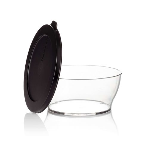 Clear Bowl 4 L | Jet Black | Clearly Elegant® Series - Clearly Elegant® features a modular design and is part of an interlocking series, offering versatile and space-saving solutions. Each serving bowl comes complete with a base and a lid for added convenience.
Brand new Clearly Elegant® range now made from Eco+ material! With a glass-like look but a light-weight feel, the Clearly Elegant® range is perfect to prep, store, transport, serve and save! From fridge to table convenience these bowls are ideal for indoor or outdoor dining. The ECO+ material is made through a process that takes single-use plastics that would normally end up in landfill and gets recreated into a high-quality food grade container. You’re not only reducing waste, you’re creating less waste by using a product that can be used over and over again!  Specifications: Capacity: 4 L 
 Dimensions: L 27.38 x H 11.87 CM
 Color: Jet BlackBenefits: The modern, clear, glass-like appearance of these Bowls makes them suitable for use on the table and out and about.  Clear base allows you to see contents at a glance. Liquid tight Seals keep contents fresh and makes these bowls suitable for transporting treats to functions.  The tab on the Seal makes it easy to open and close and ideal for storing leftovers. When applied, the Seal creates a flat surface. Other bowls can be stacked on top–convenient. Each bowl nests inside each other. If you have storage space for the largest bowl in your kitchen you have room to store the entire collection!  Small and compact in any size kitchen. 
Use & Care:Dishwasher Safe however handwashing is highly recommended to preserve the shiny quality of the bowl. Place Seal on top rack of the dishwasher to avoid warping Not suitable for the microwave, freezer or oven Staining and scratches are normal and will not affect the performance of the product. This is not covered by Tupperware warranty. To avoid scratching, it is not recommended to store granulated sugar coated sweets or biscuits or to store coarse salt coated snacks Tupperware recommends plastic utensils to prevent damage to the product.  Do not use for citrus or ginger products, as discolouration may occur Suitable for cold foods only.