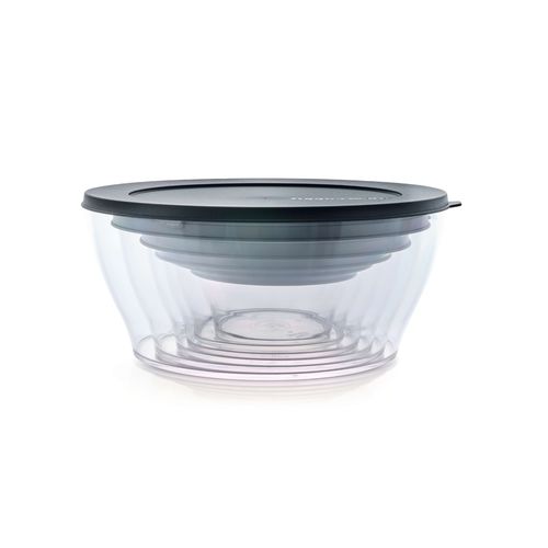 Essential Set of Clearly Elegant® Bowls with Covers (12 Pieces) - This 12 Piece Set Includes:Clear Bowl 290 ML with Cover Clear Bowl 610 ML with Cover Clear Bowl 990 ML with Cover Clear Bowl 1.3 L with Cover Clear Bowl 2.4 L with Cover Clear Bowl 4 L with CoverClearly Elegant® features a modular design and is part of an interlocking series, offering versatile and space-saving solutions. Each serving bowl comes complete with a base and a lid for added convenience.
Brand new Clearly Elegant® range now made from Eco+ material! With a glass-like look but a light-weight feel, the Clearly Elegant® range is perfect to prep, store, transport, serve and save! From fridge to table convenience these bowls are ideal for indoor or outdoor dining. The ECO+ material is made through a process that takes single-use plastics that would normally end up in landfill and gets recreated into a high-quality food grade container. You’re not only reducing waste, you’re creating less waste by using a product that can be used over and over again!  Specifications:Color: Jet BlackBenefits: The modern, clear, glass-like appearance of these Bowls makes them suitable for use on the table and out and about.  Clear base allows you to see contents at a glance. Liquid tight Seals keep contents fresh and makes these bowls suitable for transporting treats to functions.  The tab on the Seal makes it easy to open and close and ideal for storing leftovers. When applied, the Seal creates a flat surface. Other bowls can be stacked on top–convenient. Each bowl nests inside each other. If you have storage space for the largest bowl in your kitchen you have room to store the entire collection!  Small and compact in any size kitchen. 
Use & Care:Dishwasher Safe however handwashing is highly recommended to preserve the shiny quality of the bowl. Place Seal on top rack of the dishwasher to avoid warping Not suitable for the microwave, freezer or oven Staining and scratches are normal and will not affect the performance of the product. This is not covered by Tupperware warranty. To avoid scratching, it is not recommended to store granulated sugar coated sweets or biscuits or to store coarse salt coated snacks Tupperware recommends plastic utensils to prevent damage to the product.  Do not use for citrus or ginger products, as discolouration may occur Suitable for cold foods only.