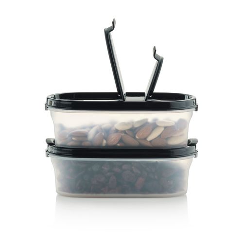 Oval 1 | 550 ML | Jet Black | Modular Mates® Series - Say goodbye to chaos!
 This Oval food storage container is designed to maximize shelf space in shallow cabinets and storage drawers. It works like building blocks with additional Modular Mates® containers to fit your shelves.
 The airtight, moisture-proof, and bug-proof lid keeps food fresh and safe for longer. It's the best container for dry foods like snacks, cereal, pasta, nuts, dried fruits, tea, and so much more.
Specifications: Capacity: 550 ML (2 Cups)
 Dimensions: W 9.5 x H 6 x L 19 cm
 Color: Jet Black (seal)
 Benefits:Freshness seal: airtight, moisture proof, and insect proof to protect food; retains crunch of crunchy foods and softness of soft foods Modular system: designed for easy stacking and named by height; for example, two Oval 1 = one Oval 2, and one Oval 1 + one Oval 3 = one Oval 4; also stacks on Modular Mates® Square storage; same width as Super Ovals. Translucent container: contents visible at a glance, no more guessing or rummaging; smooth window for adding labels if needed; lightly textured sides for better grip; BPA-free. Say goodbye to chaos! more organized and no more open packages that risk spillages in the drawers/cupboards. Use & Care:Wash before first use. Dishwasher safe Not freezer safe Not safe for use in microwave Can be recycledTips: Wash between refills of oil-containing foods such as chips, cookies, nuts, seeds, etc.
 Two Ovals fit side by side atop one Square.Stores up to:
 ± 300-350 g | 10-12 oz raisins and other dry fruits ± 500 g | 1 lb fine salt ± 250 g | ½ lb spices (curry, paprika…) ± 150 g | 5 oz instant coffee ± 200 g | 7 oz loose black tea