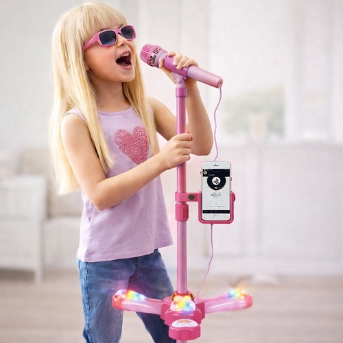 Microphone VA295407 - This is a Barbie-branded toy karaoke microphone set featuring an adjustable stand, built-in light effects, and functionality to connect to external audio devices.&nbsp;Includes a microphone, speaker base, and telescopic stand to amplify a child's voice.&nbsp;Features colorful dazzling lights and can be connected to audio players for singing along.