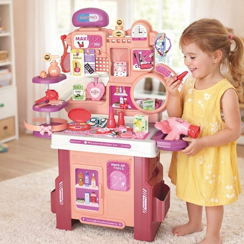 Dressing Table VA282151 - This playset includes a 42-piece beauty and makeup kit designed for children.&nbsp;It features a bright pink and purple design, a mirror, and accessories like a hair dryer.