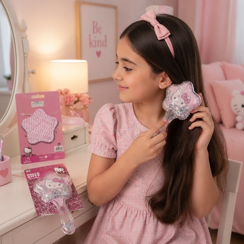 2S50772 HK Hair Brush - This Hello Kitty hairbrush from M.A Stationers features a star-shaped head with a glitter-filled, snow-globe style backing.
