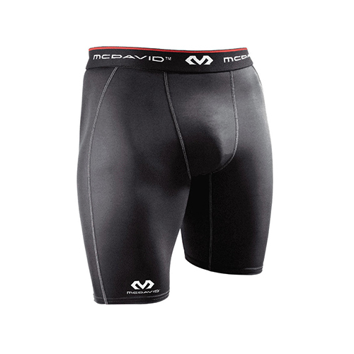 Padel Store - McDavid 8100 Deluxe compression Black Short - DescriptionCompression Technology warms and stabilizes muscles for improved performance. Comfort fit improves the second-skin feeling and prevents irritation. 6 thread flat-lock technology for strenght at the seams. 
Features• hDc™ Moisture Management Technology is all about cool and dry
• 85% Nylon / 15% Elastane 
 Stand with your stomach relaxed (c'mon, you're among friends here). Measure the minimum circumference (skinniest part) in the waist area. Tape should be parallel with the floor. SIZECMINCHESYouth S-61-24”Youth M61 – 6624 – 26”Youth L66 – 7626 – 30”Men S71 – 7628 – 30”Men M76 – 8630 – 34”Men L86 – 9734 – 38”Men XL97 – 10738 – 42”Men XXL107 – 11742 – 46”