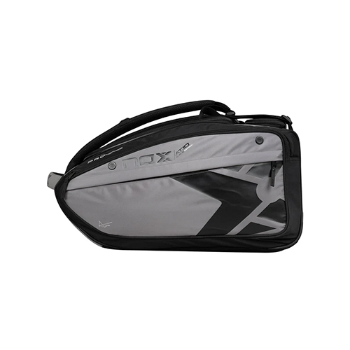 Padel Store - Nox AT10 Competition XL Compact Padel Racket Bag - FEATURES:Main compartment with side opening with capacity for 4 padel rackets, clothes, etc. Ventilated compartment for shoes inside the main compartment. Circular thermal compartment (NOX ThermoTech technology) for 4 balls or bottle. Thermal compartment (NOX ThermoTech technology) with capacity for 3 padel rackets, bottles etc. Side compartment with distributed pockets for accessories, cell phone, wallet, keys, etc.. Side compartment with ventilation system. Laundry bag. Pocket on the back. Backpack function with the possibility of removing the handles. Ergonomic main handle. Rigid base. Dimensions: 600 x 300 x 450 mm Capacity: 80 litersRef: BPAT10COMXL24