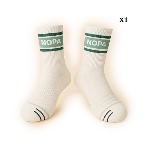 Nopa Multicolor Performance Sock (X1) - Medium (38-41)Large (41-45)Engineered for the active individual who refuses to compromise on comfort, style, or functionality, the **NOPA Performance Sock** is a seamless blend of aesthetics and performance. Designed to support you both on and off the court, these socks feature reinforced cotton in the heel and toe areas, offering superior durability and protection against blisters during intense play. 1/4 crew sockAthletic fit Seemless ToeHeel protectionArch support Hybrid Fabric 75% cotton 20% nylon 5% spandex