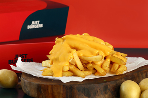 Cheesy Fries - Daily cut fresh potato with cheesy sauce.