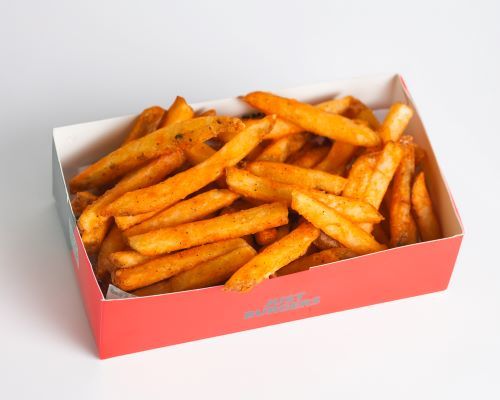Seasoned Fries - Seasoned fries served with ketchup.