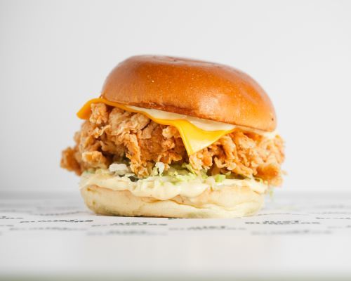 Buffalo Chicken Sandwich - chicken patty+ yellow cheese + buffalo sauce+ ranch sauce +lettuce+ pickels & bun