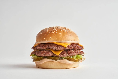 Just Burger - Sesame-coated bread 2 Fresh Kuwaiti-slaughtered&nbsp;Patty ( Lets meat ) ٫ yellow cheese ٫ just burger sauce ٫ lettuce