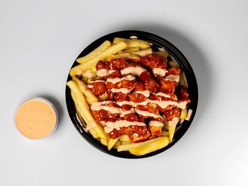 Fries with special sauce and chicken pieces - Contents Fries with special sauce and chicken pieces with special seasoning