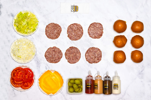 Special Slide Beef Box 12 pcs - Box Contents * Contains 12 burgers with special seasoning. * In addition to: samoon - cheese - lettuce - tomatoes - onions. * 4 types of sauces, in addition to pickles.