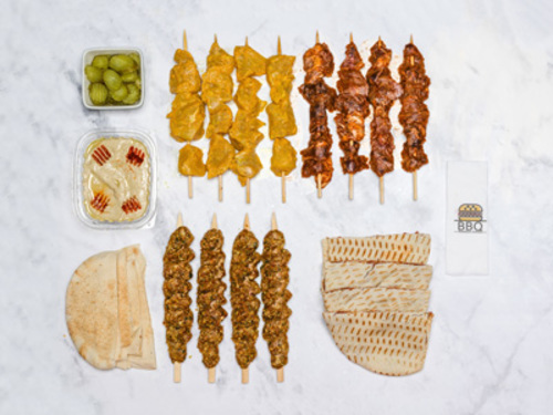 Mix grills 3 - The contents of the box 
 Iraqi kebab dish Shish tawook dish Arayes dish Tikka dish With bread and hummus