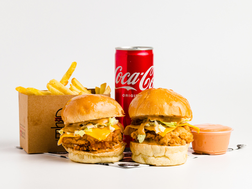 Crispy Chicken Slider Meal - 2 Pieces of crispy chicken fillet slider in brioche bun with lettuce, cheese, special sauce, with cola, and French fries.