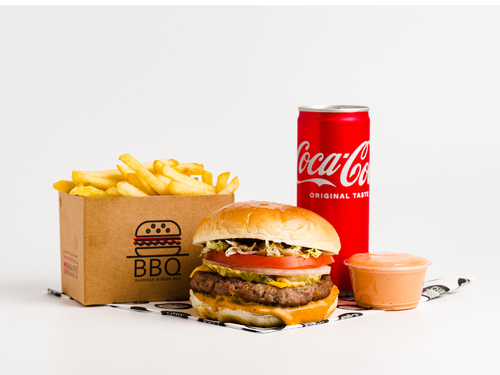 BBQ Beef Burger Meal - Specially seasoned meat in bread with lettuce, tomatoes, onions, cheese, special sauce, pomegranate molasses sauce with french fries and cola.