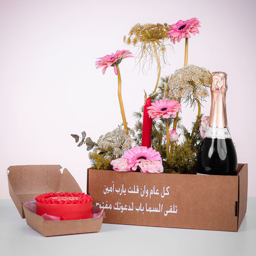 NEW YEAR 008 - The box contains flowers, cake and rasberry champaign