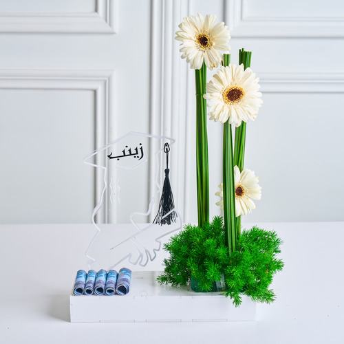 GR03 - mix flowers in an elegant acrylic box for our graduate  with the name of the graduated