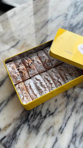 Financier Box - a small, French almond cake, traditionally baked in a rectangular, gold-bar shaped mold