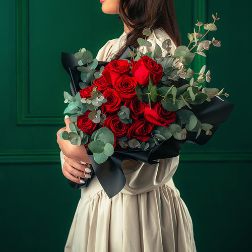 Red - Hand tied bouquet red roses and eucalyptus leaves. 
 H 60 cm x W 35 cm