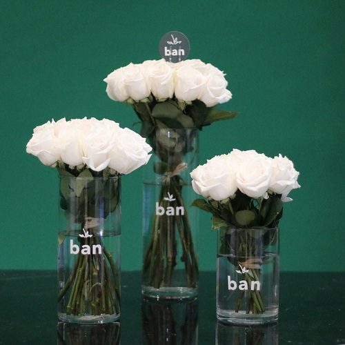 White Roses Trio - 3 white roses bouquets in 3 cylinder glass vases. H 40 x W 20 cm,