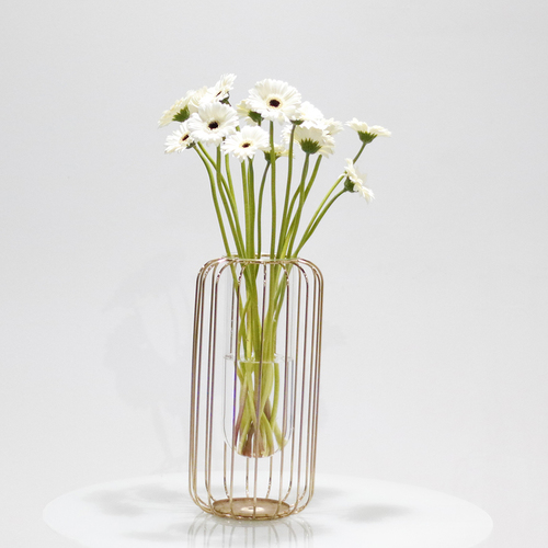 Akmar - This unique vase contains white gerbera flowers. H 60 x W 30 cm.