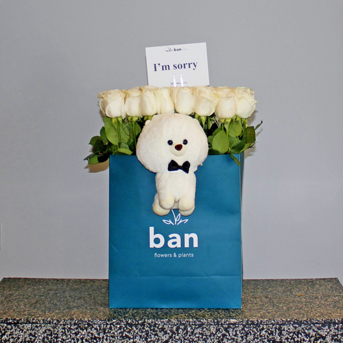 Bag of White Roses - Bag filled with white roses with toy.