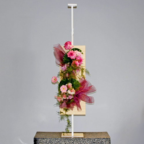 Dos Dizenio Flower Stand 3 - Shades of pink bouquet of roses hydrangea and gerbera arranged in rectangular wooden board and hang on a metal stand.