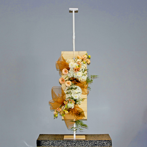 Dos Dizenio Flower Stand - White and pink shades bouquet of hydrangeas, gerbera, lisianthus and chrysanthemums arranged in wooden board and hang on a metal stand.