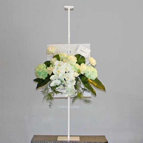 Dos Dizenio Stand 6 - A shades of white with a touch of green bouquet of roses, hydrangea and orchids arranged in a vase attached on wooden board and hang on a metal stand.