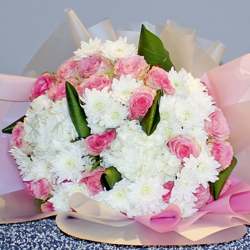 Jangmi - Pink and white hand bouquet of roses, hydrangeas and chrysanthemums with greens,