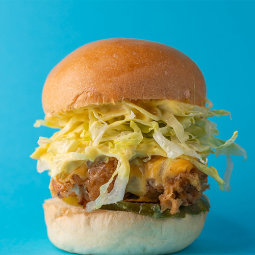 Lets Slider - Classic Chicken Slider - Chicken patty with American cheese, sliced pickle, topped with lettuce, with mustard and mayonnaise sauce.