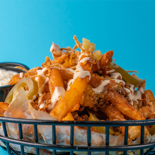 Let's Fries - Crispy fries topped with our special sauce, cheese, jalapeño and ground beef.