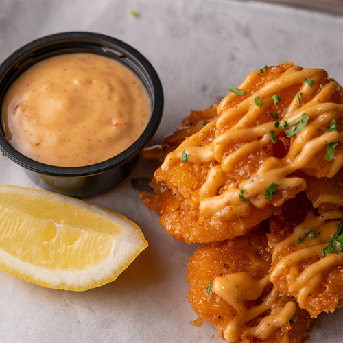 Spicy Shrimp - Fried shrimp topped with special sauce.