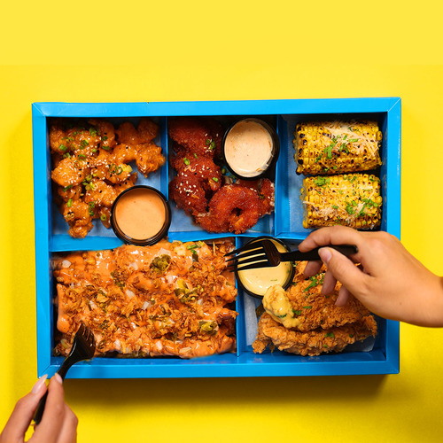 Appetizers box - Loaded fries , Bufflo shrimp , chicken tenders , corn , dynamite chicken