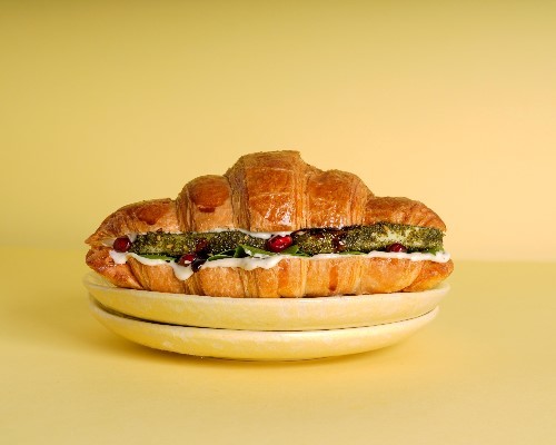 HALLOUMI Croissant - CROISSANT, grilled halloumi, rocca, pomegranate and halloumi sauce.