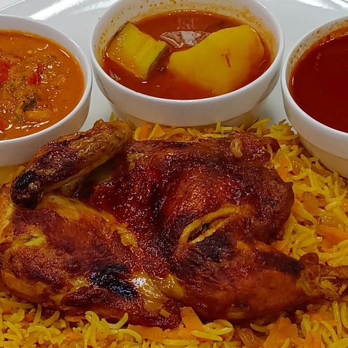 عيش بخاري نصف دجاجه شوايه