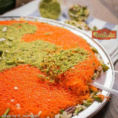 Malakiyah Ben Narin Orange - Two layers of coarse kunafa 
 stuffed with cheese or cream or half cheese and half cream with a mixture of nuts