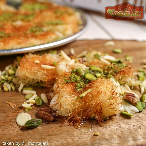 Malakiyah Ben Narin Gold - Two layers of coarse kunafa 
 stuffed with cheese or cream or half cheese and half cream with nuts