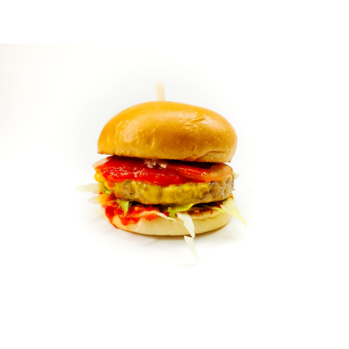 Smoked Spicy Chicken Burger - Fresh local chicken burger smoked for more than 6 hours, breeding Kuwait farms, free of hormones, antibiotics, balanced nutrition between grain, grass, served with cheddar cheese, lettuce, tomatoe and spicy sauce.