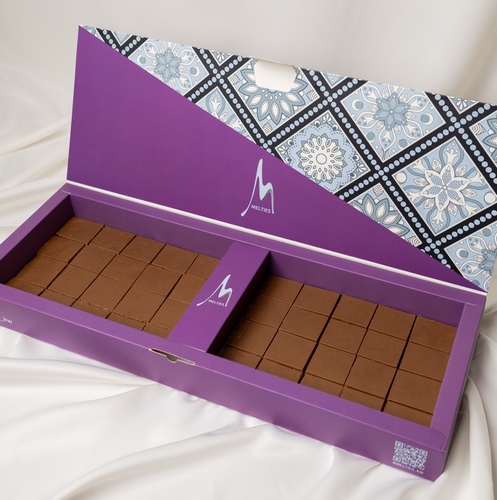 Melties  - Melties Squares - 40 pieces of smooth chocolate squares infused with crunchy pecan pieces and a layer of delightful caramel