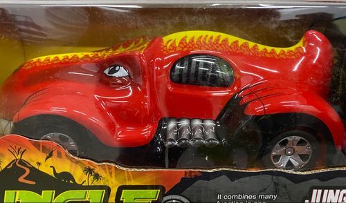 Happy Kids  - Jungle alligator Exp.-VS0605 - The off-road toy vehicle has shock absorption. Use the radio to control the alligator in all directions - forward, backward, left and right. The truck's design features a wild-faced red alligator with a yellow stripe print.