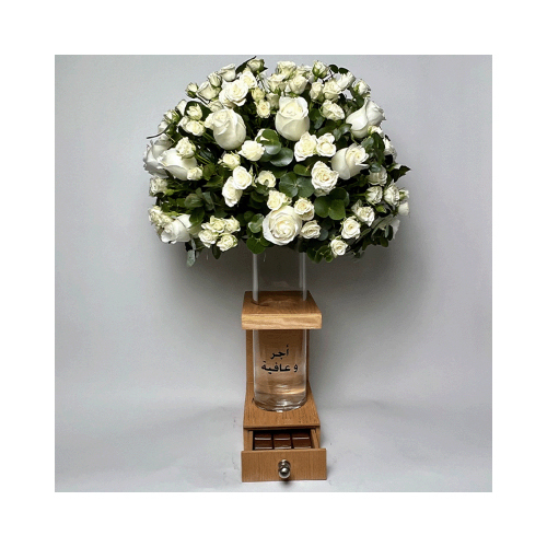 Sunshine - This wooden basket contains mixed white flowers of roses and baby roses with green leaves and Belgian chocolates.
 Height: 70cm  Width: 50cm  Sell by: Quantity