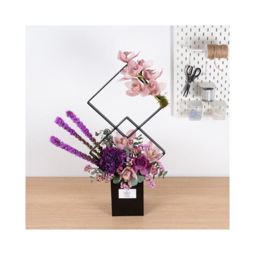 Lilac - This double squared stand contains shades of purple cymbidium, liatris, hydrangea and brassica.
Height: 80cm Width: 45cm Sell by: Quantity