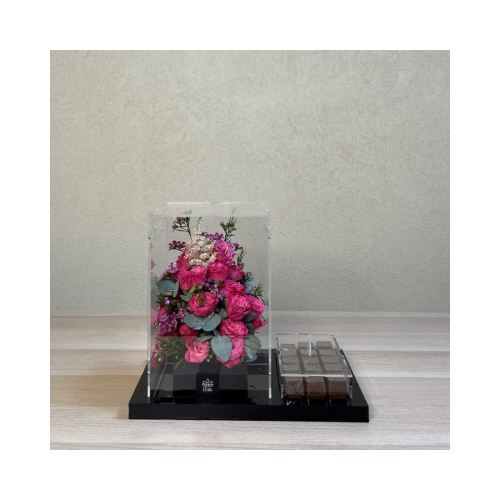 Simple Tray - This acrylic tray contains baby roses flowers with Belgian chocolates.
 Height: 26cm  Width: 30cm  Sell by: Quantity